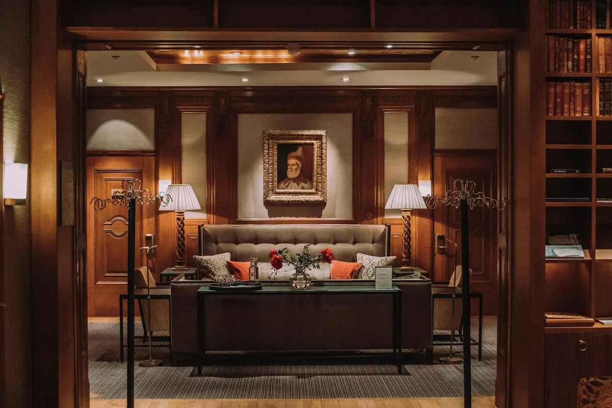 Warm, wood-panelled hotel lobby lounge